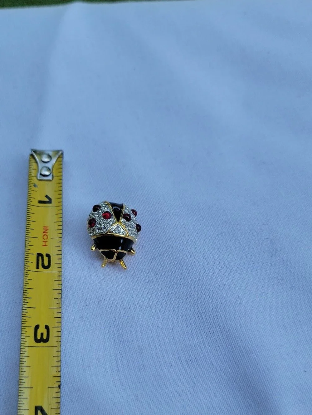 Vintage Joan Rivers Black Enamel and Red Crystal Ladybug Brooch